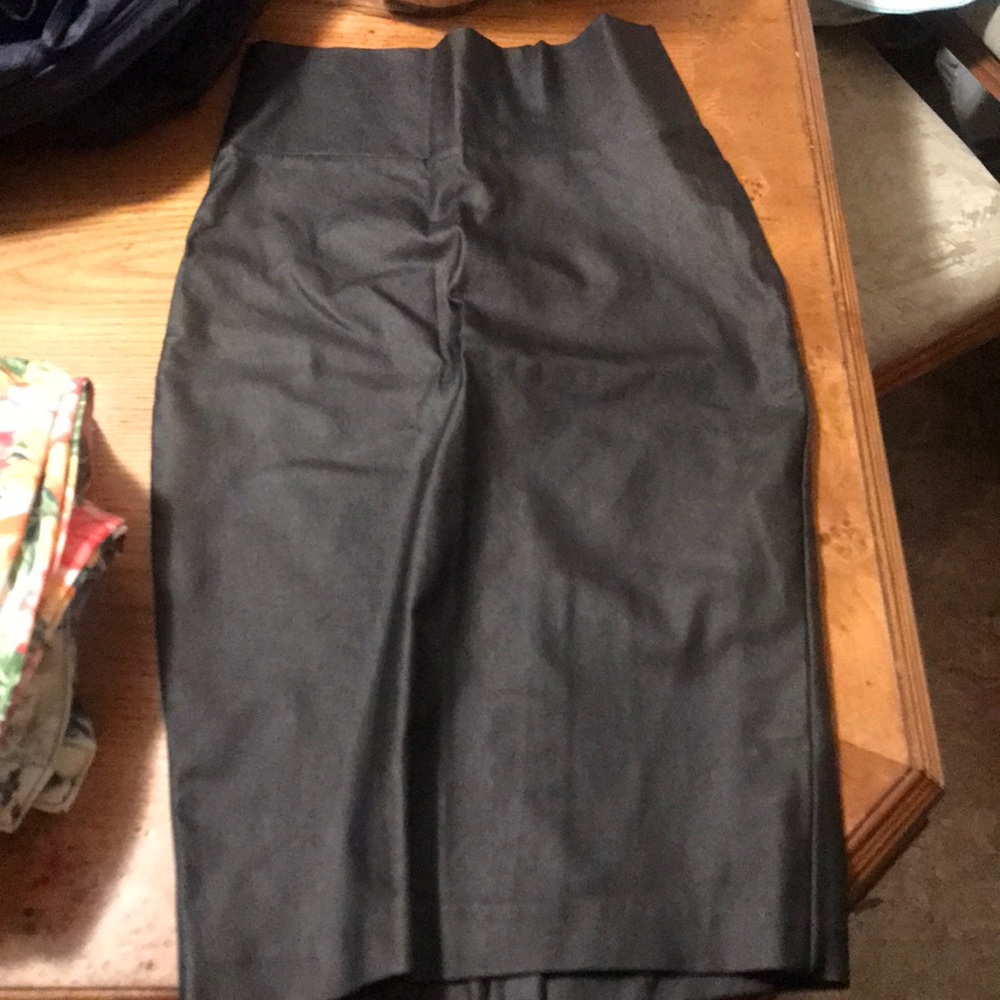 Black leather pin skirt